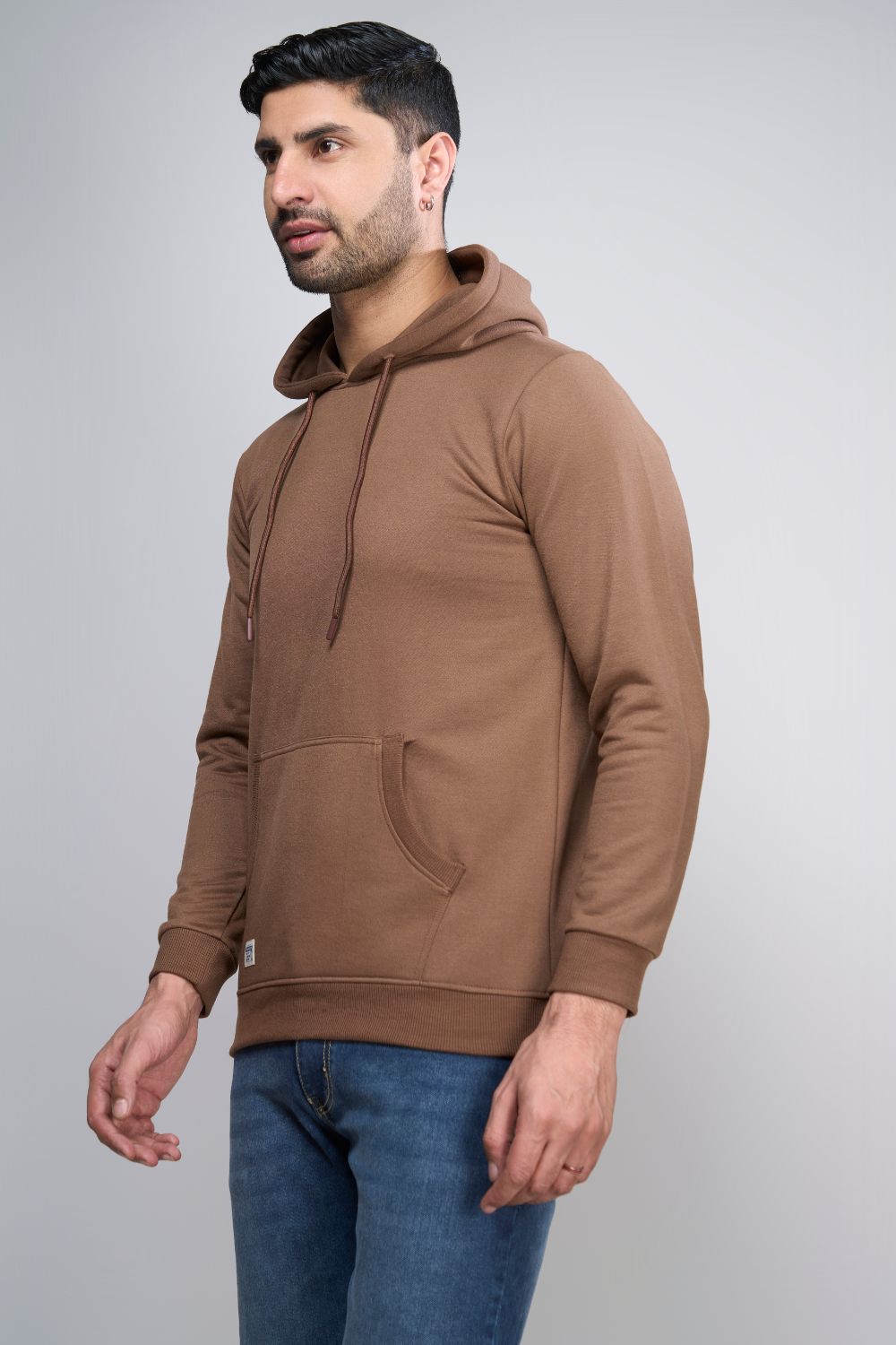 Dark Tan colored, hoodie for men with full sleeves and relaxed fit, side view.