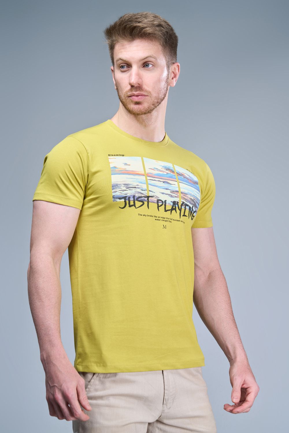 Yellow colored, cotton Graphic T shirt for men, half sleeves and round neck, side view.