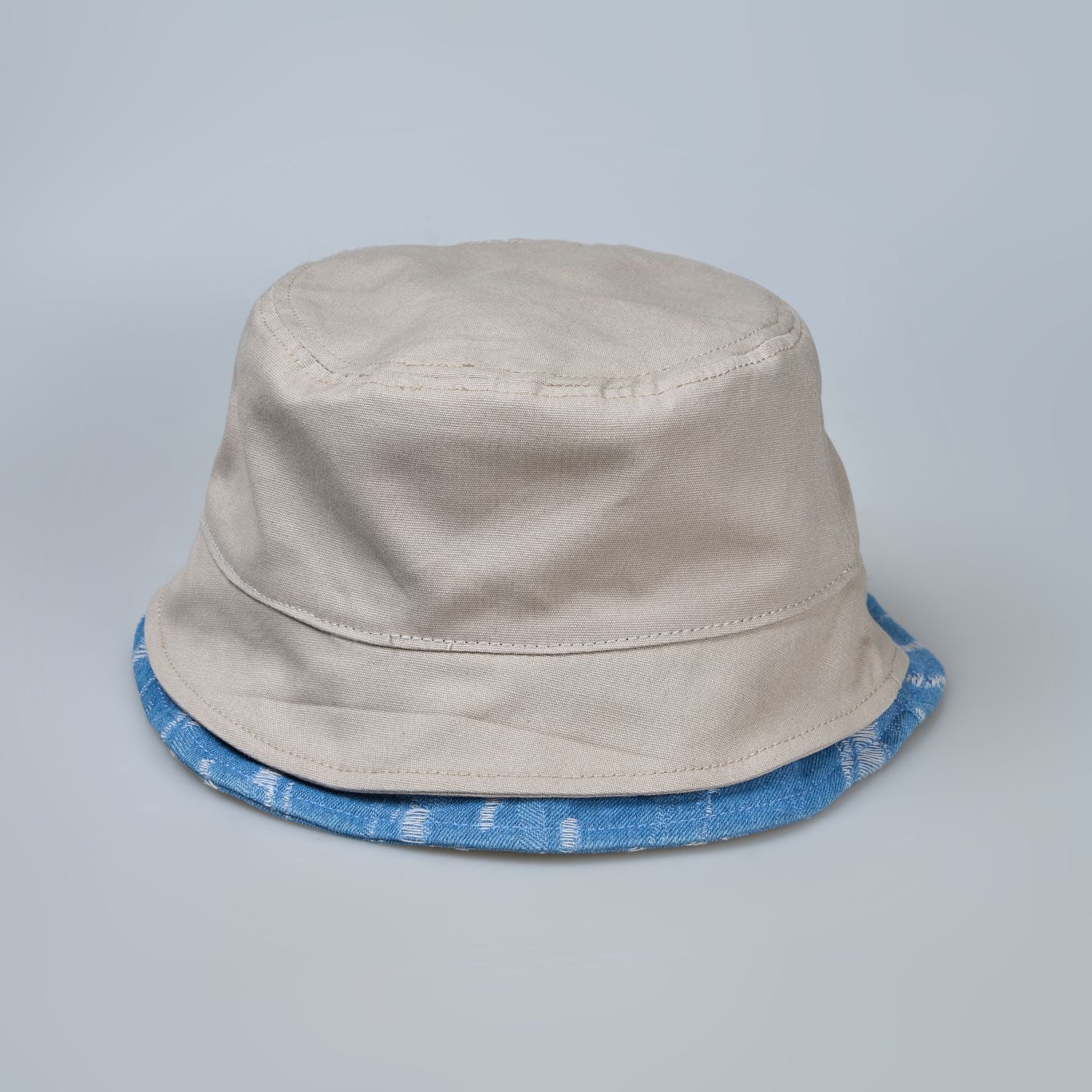 Back view of beige colored bucket hat for men