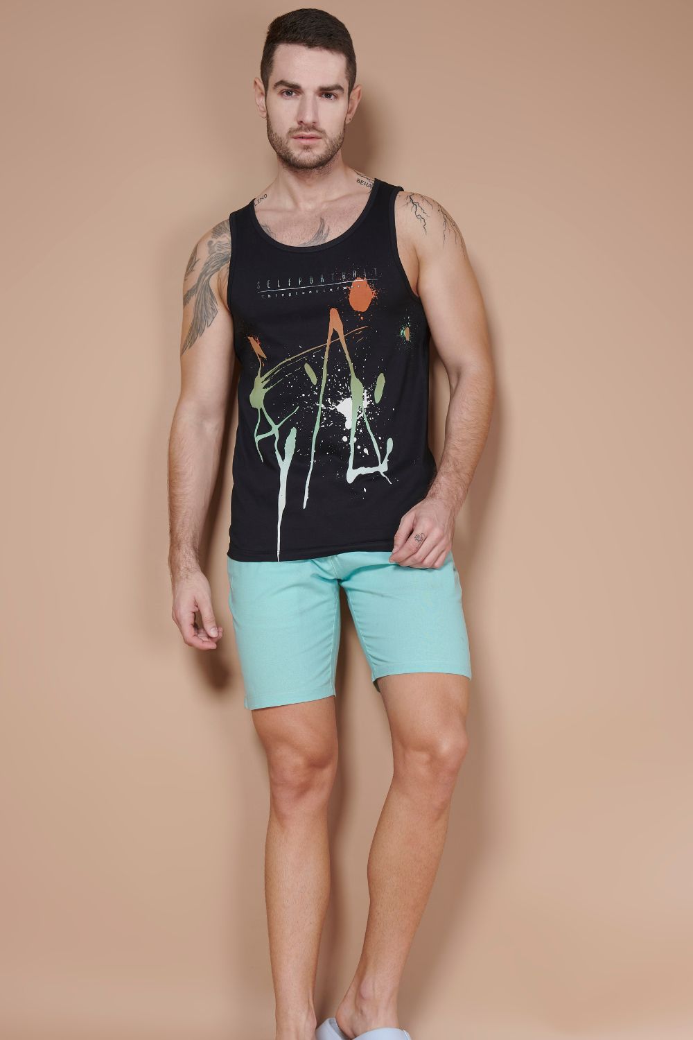 Black colored cotton Sleeveless Printed Tank Tees for men, front.