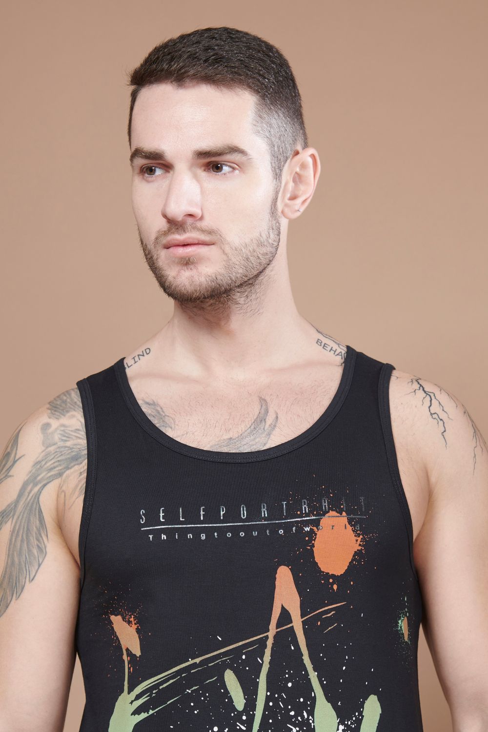 Black colored cotton Sleeveless Printed Tank Tees for men, close up.