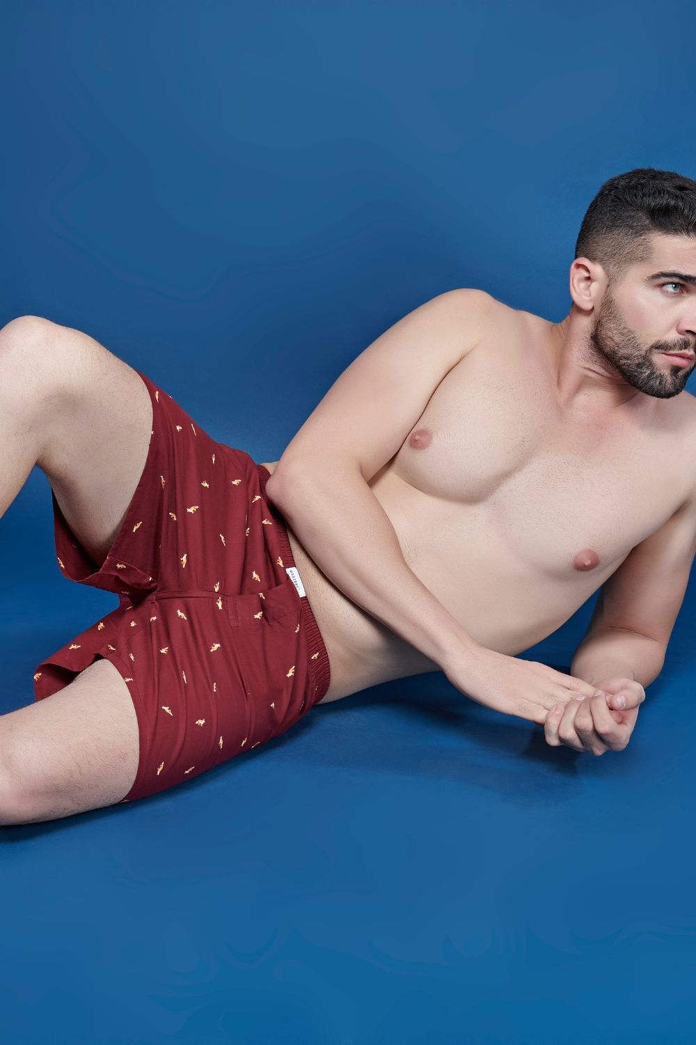 chilly red colored all over printed cotton boxer for men with back pockets.