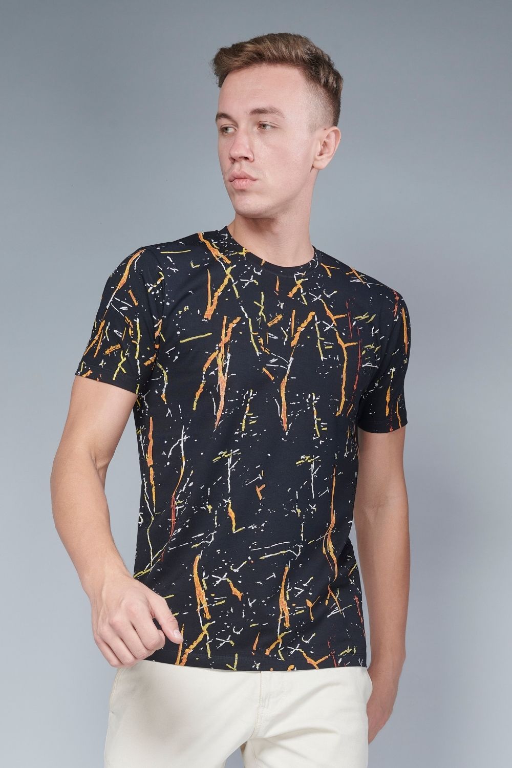 Black color, sprinkle patterned all over print T shirt for men with half sleeves and round neck, front view.