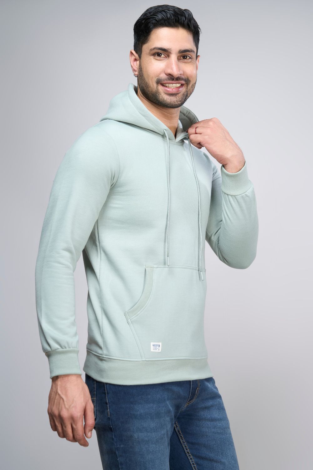 Sea Green colored, hoodie for men with full sleeves and relaxed fit, pocket view.