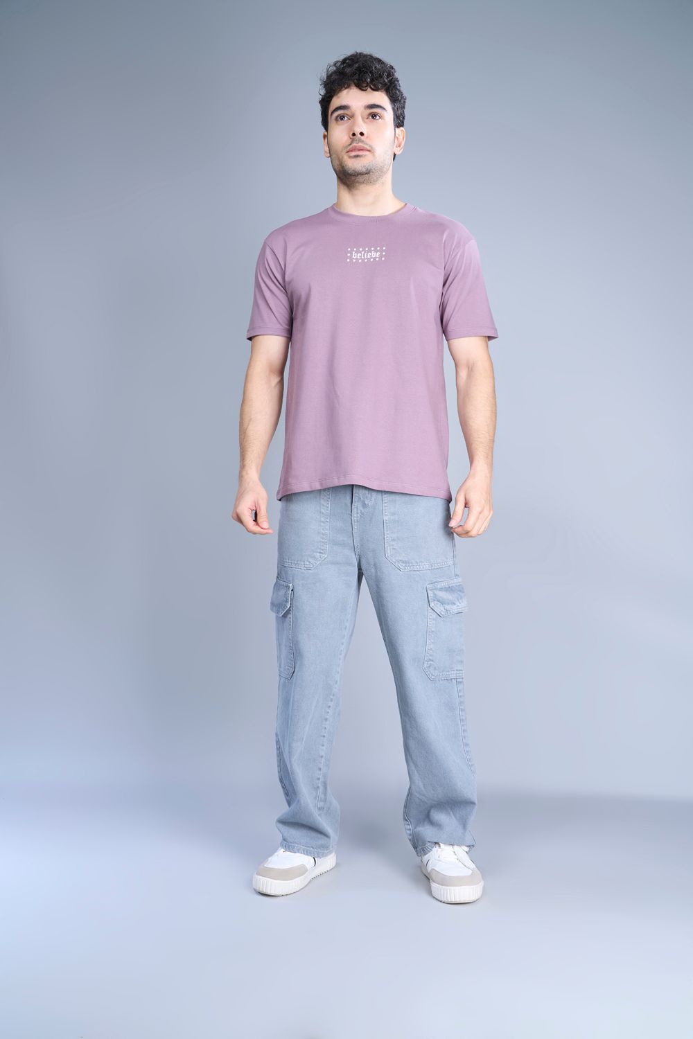 Cotton oversized T shirt for men in the solid color Opera Mauve with half sleeves and crew neck, front view.