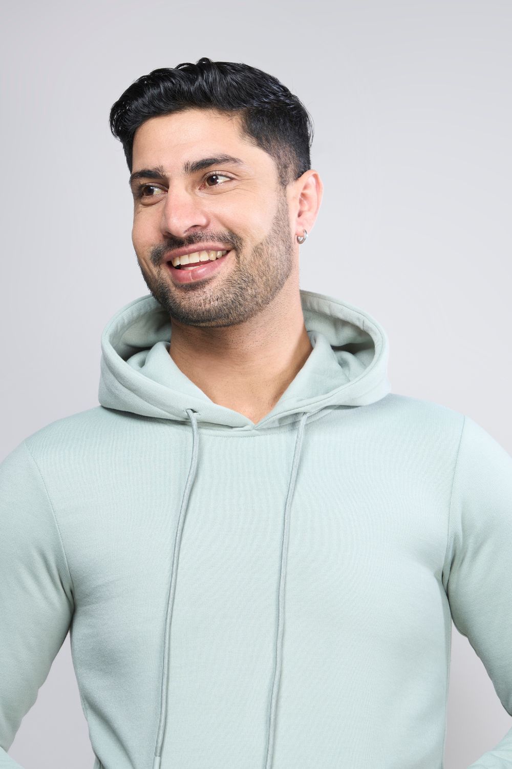 Sea Green colored, hoodie for men with full sleeves and relaxed fit, closeup.