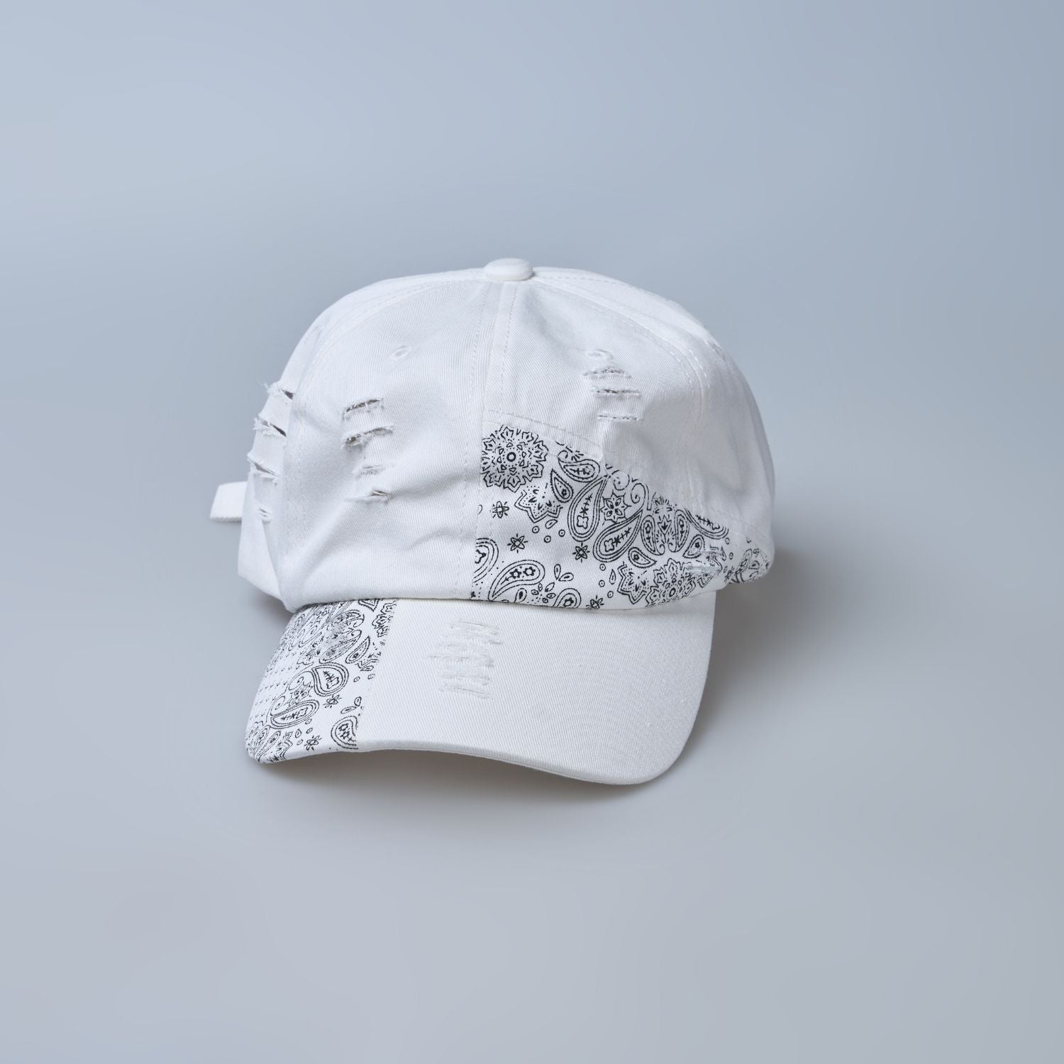 white colored, wide brim designer cap for men with adjustable strap, front view.