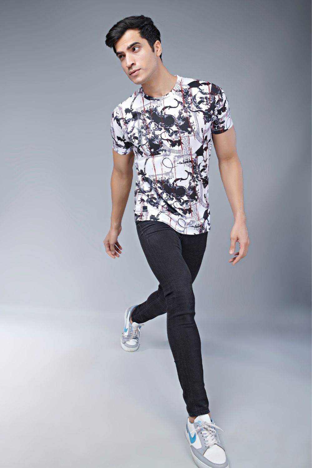 Black and White colored, all over print T shirt for men with half sleeves and round neck.