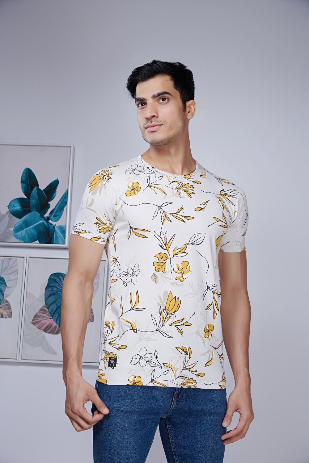White color, blossom style all over print T shirt for men with half sleeves and round neck, close up.