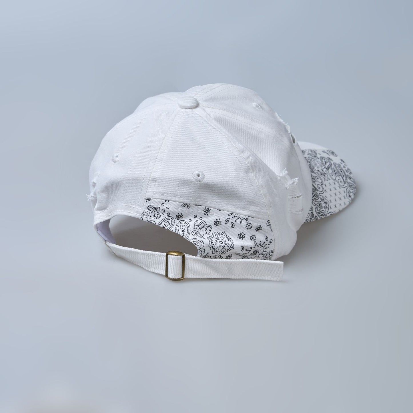 white colored, wide brim designer cap for men with adjustable strap, back view.