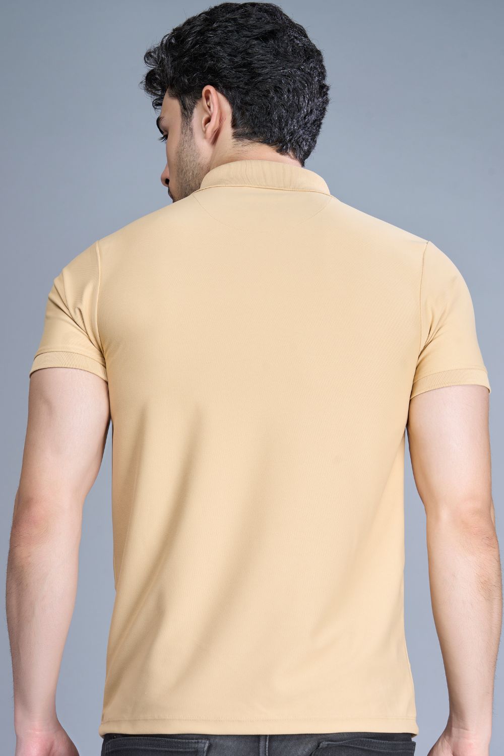 Bisque colored, zipped Polo T-shirts for men with collar and half sleeves, back view.