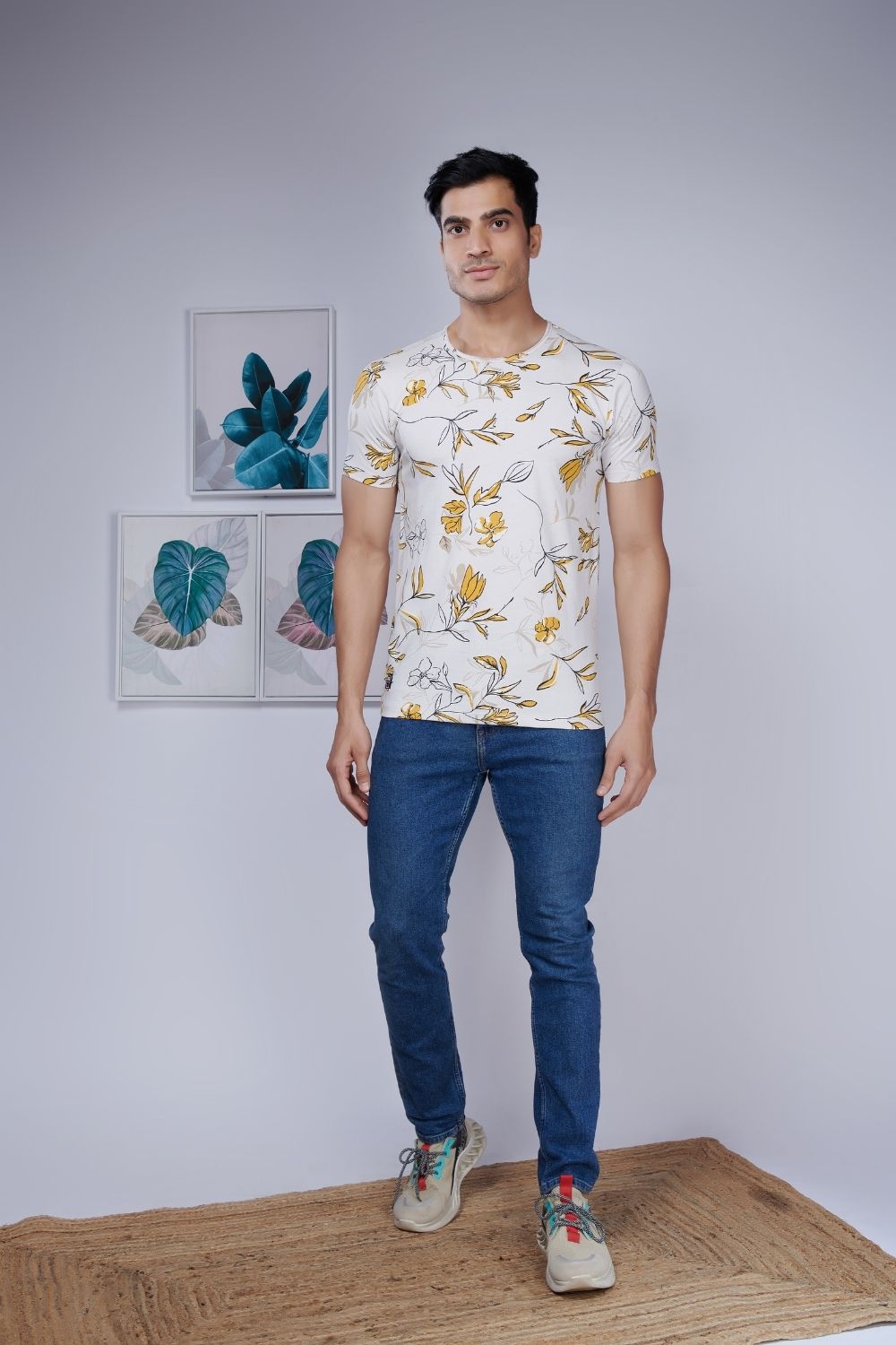 White color, blossom style all over print T shirt for men with half sleeves and round neck, front view.
