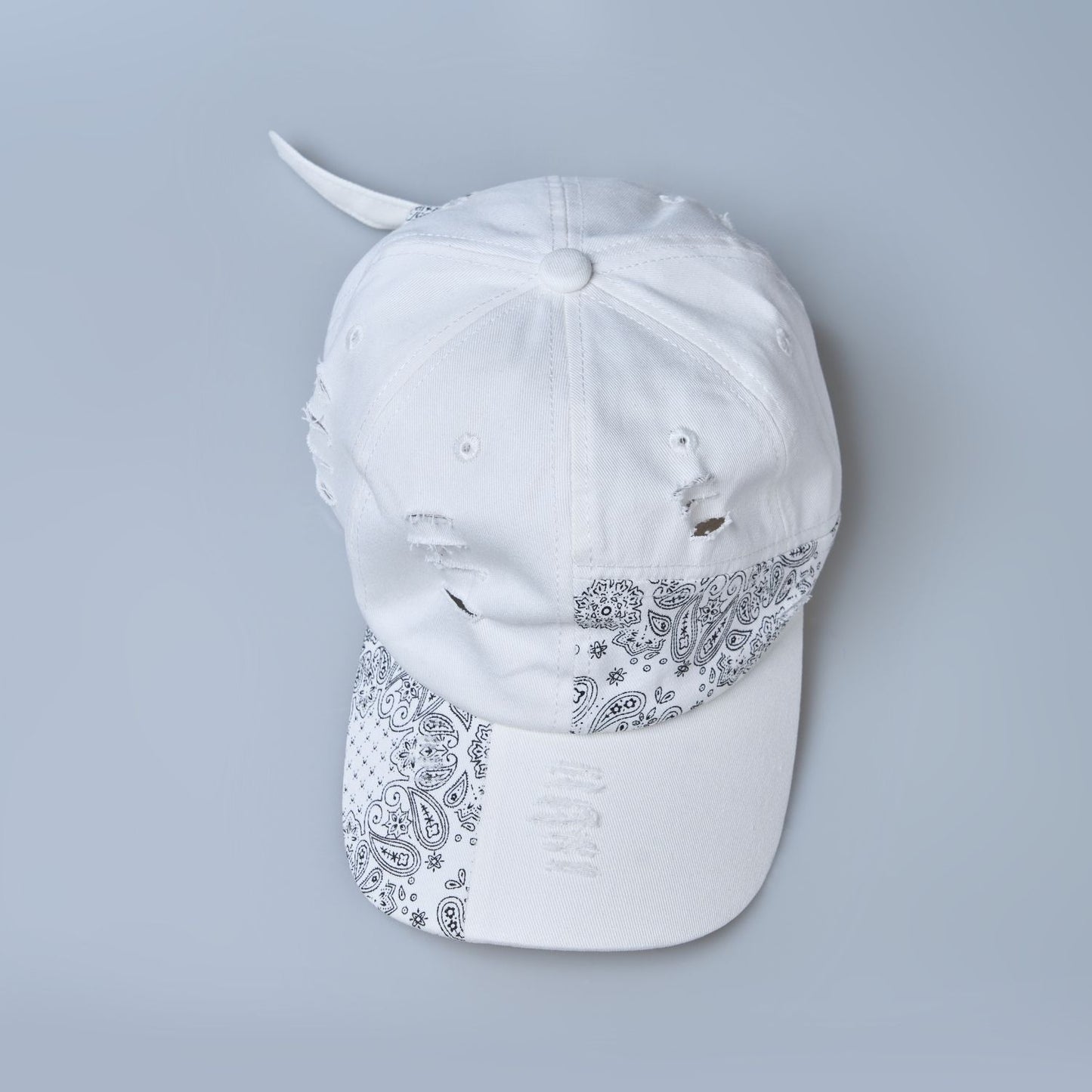 white colored, wide brim designer cap for men with adjustable strap, up view.