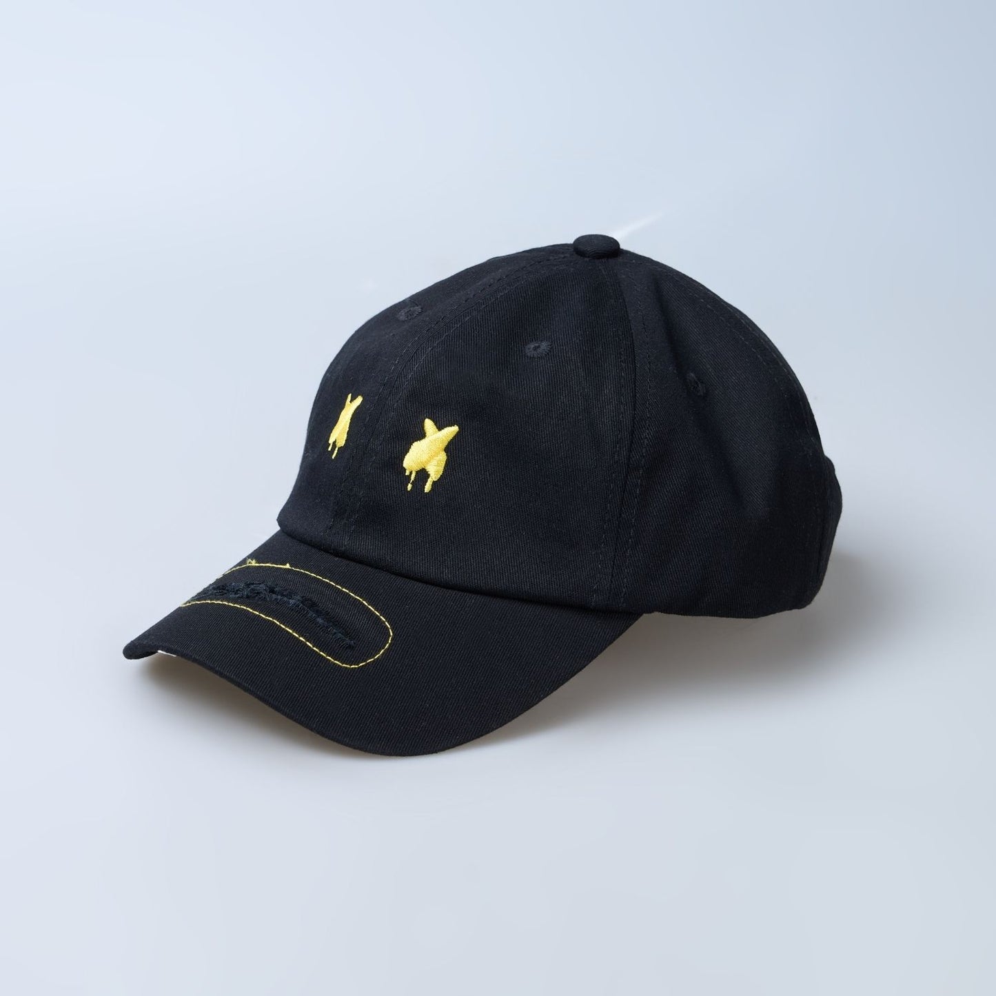 Close up of Black colored solid basic cap for men.