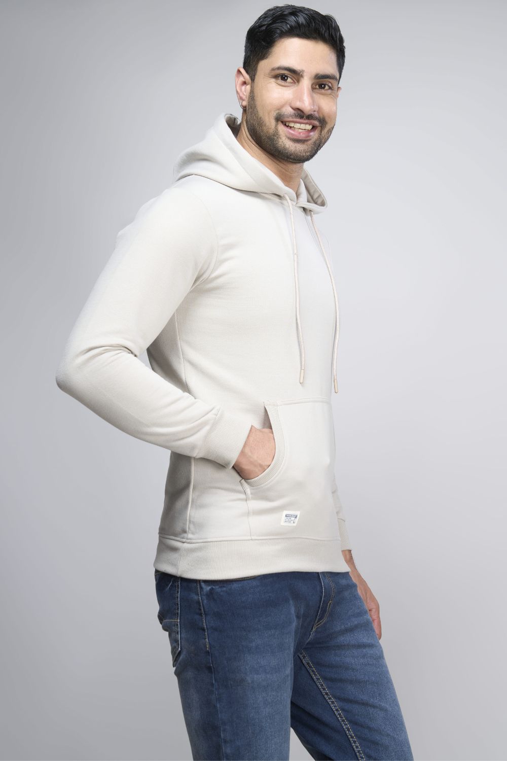 Silver Grey colored, hoodie for men with full sleeves and relaxed fit, side view.