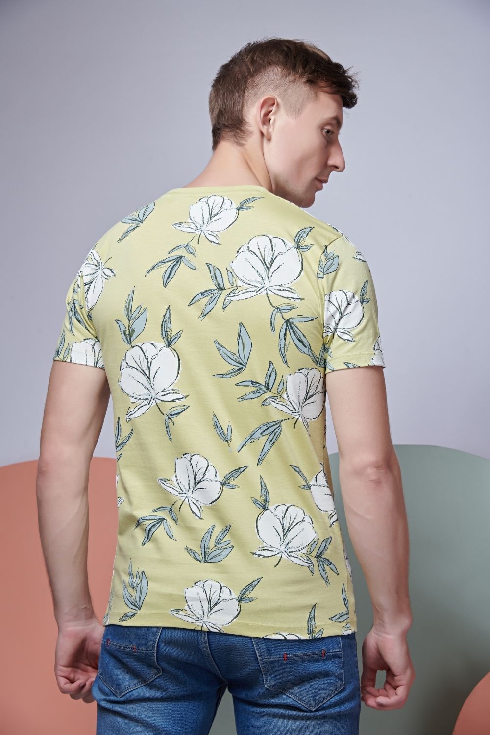 Back View of Pale rose style all over print T shirt for men with short sleeves and round neck.