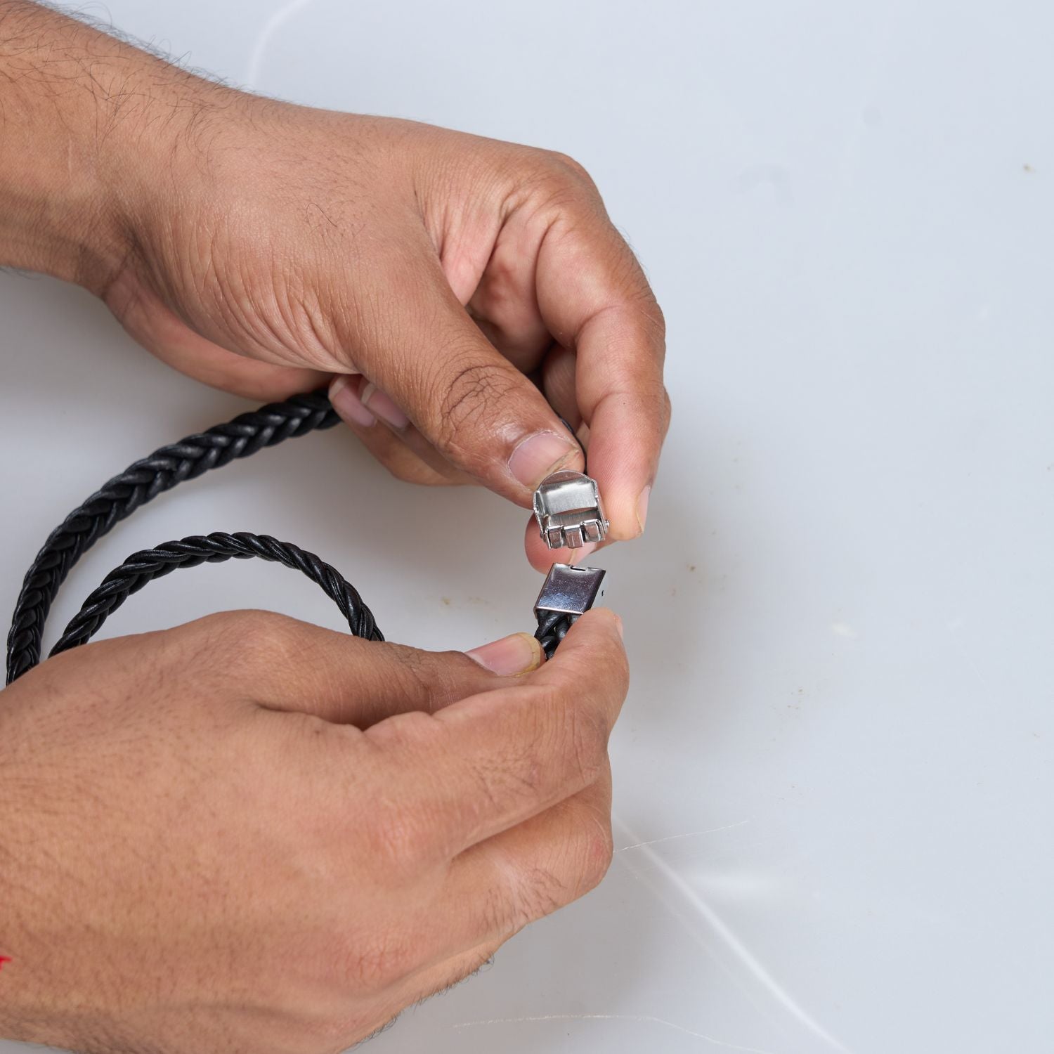 close up of Buckle clasp, Black colored long Bracelet for men. 