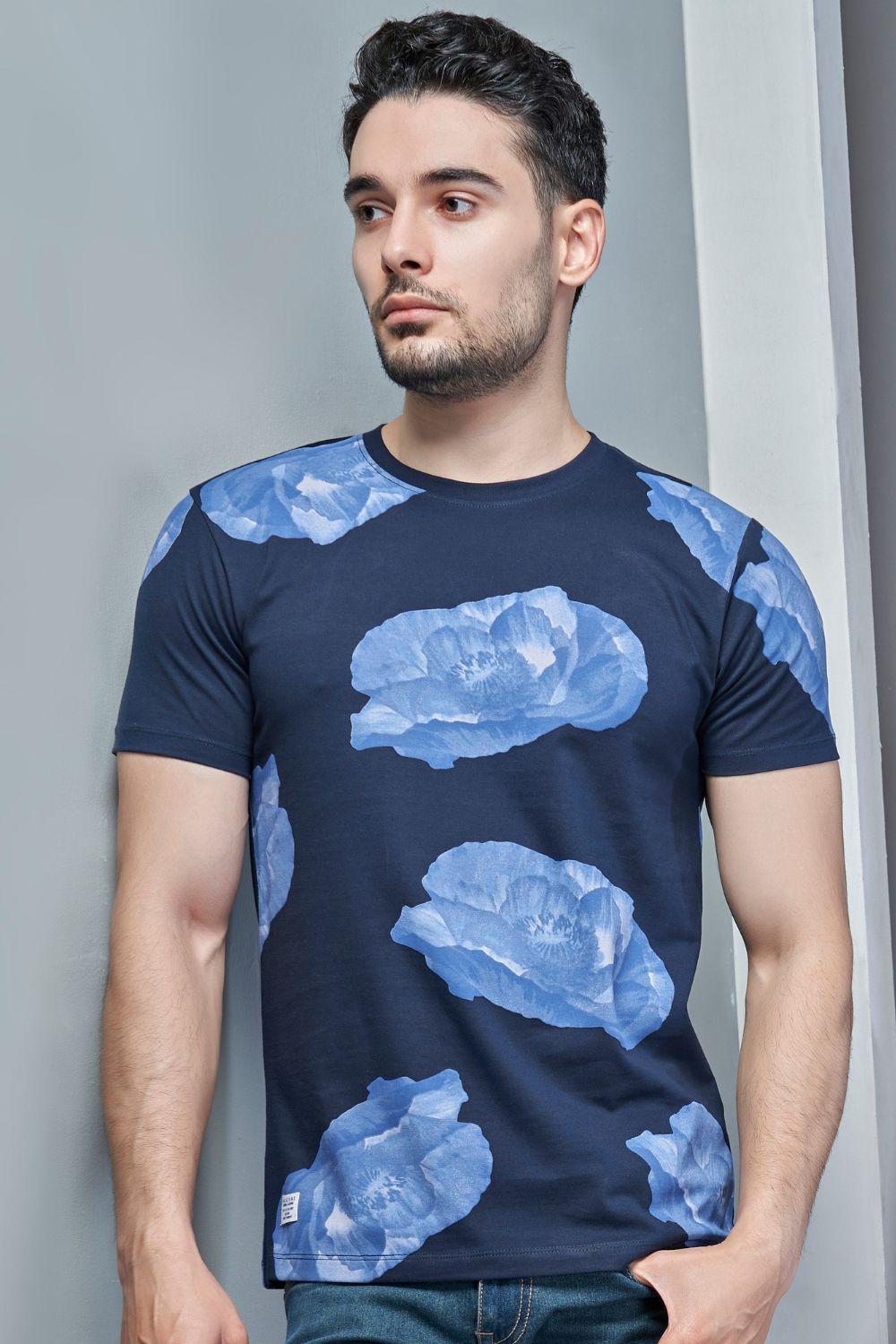 Front View of Royal Blue colored all over rose print T shirt for men with half sleeves and round neck.