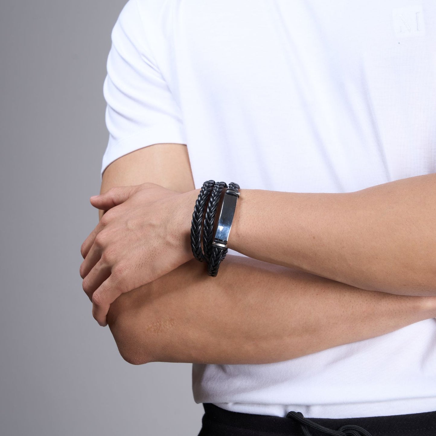 Black colored long Bracelet for men, with Buckle clasp.