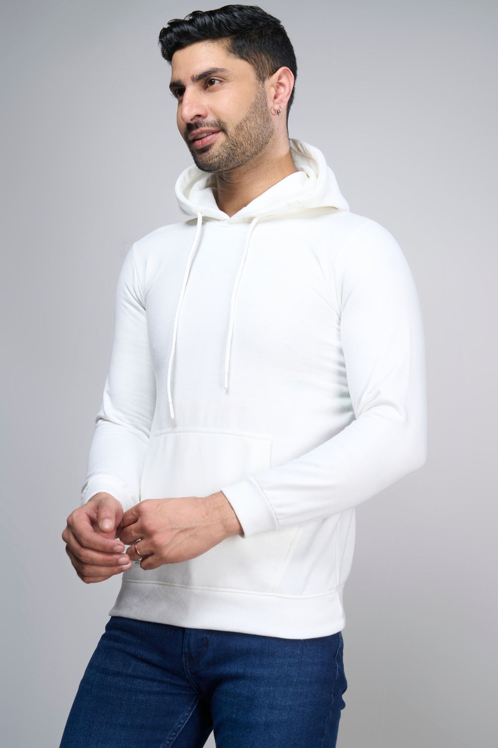 White colored, hoodie for men with full sleeves and relaxed fit, side view.