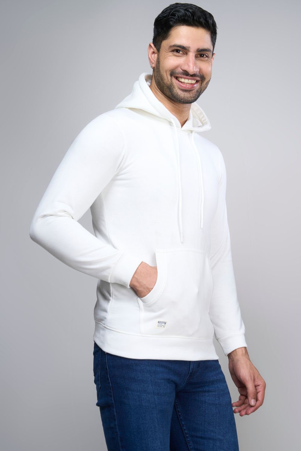 White colored, hoodie for men with full sleeves and relaxed fit, pocket view.