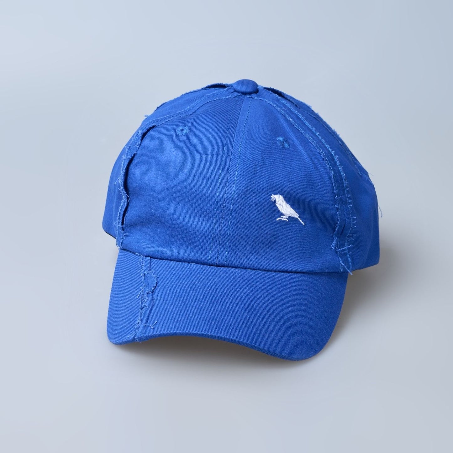 Blue colored, wide brim cap for men with adjustable strap, front view.