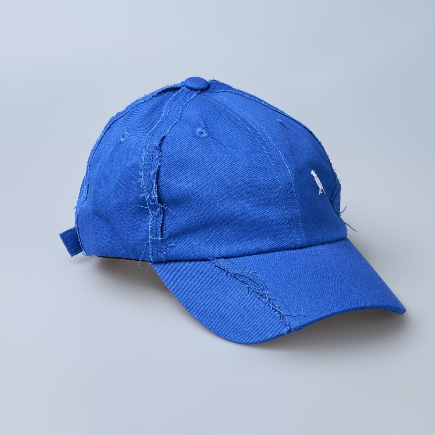 Blue colored, wide brim cap for men with adjustable strap, close up view.