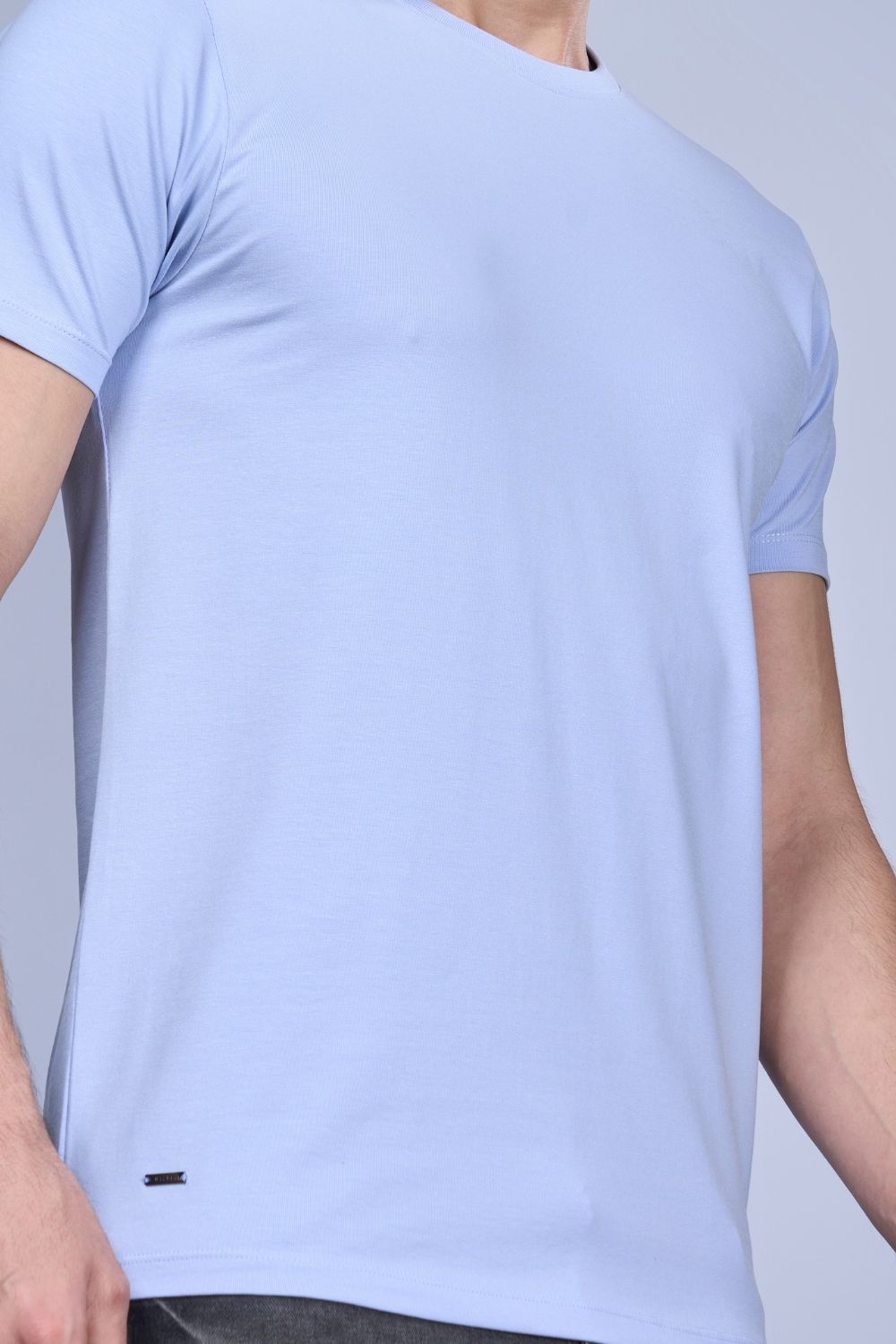 Cotton Stretch T shirt for men in the the solid color Powder Blue with half sleeves and round neck, close up.