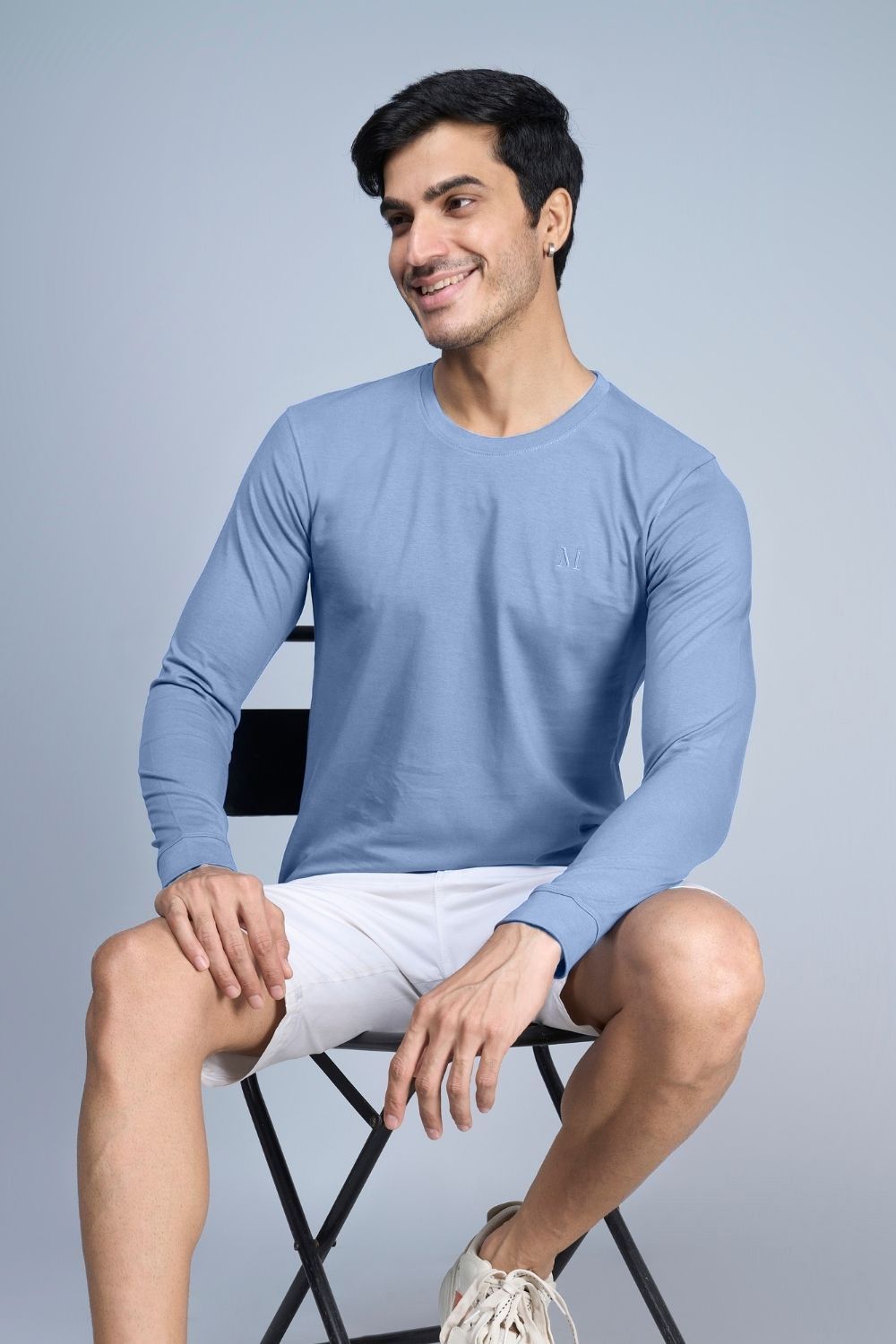 N. L. Blue colored, full sleeve solid T shirt for Men with round neck.