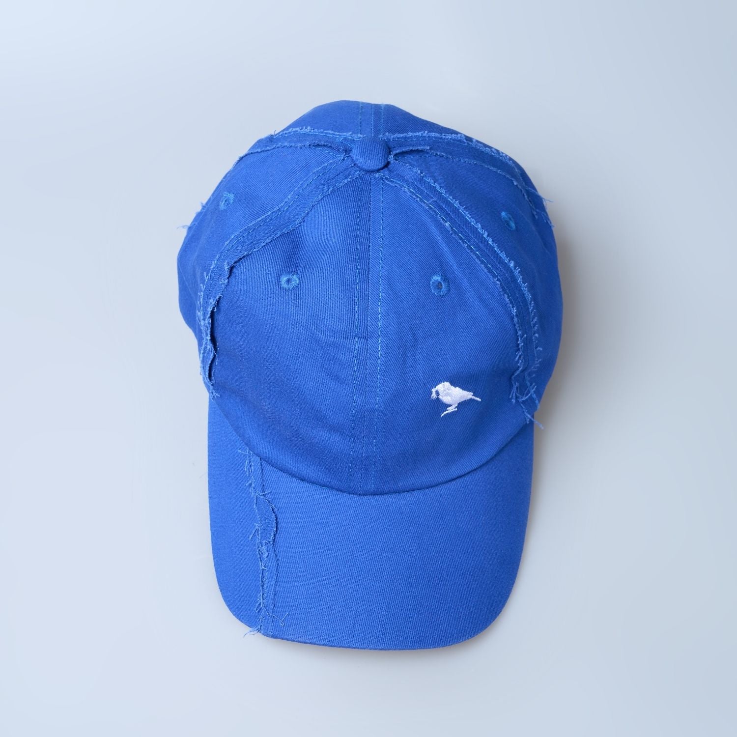 Blue colored, wide brim cap for men with adjustable strap, up view.