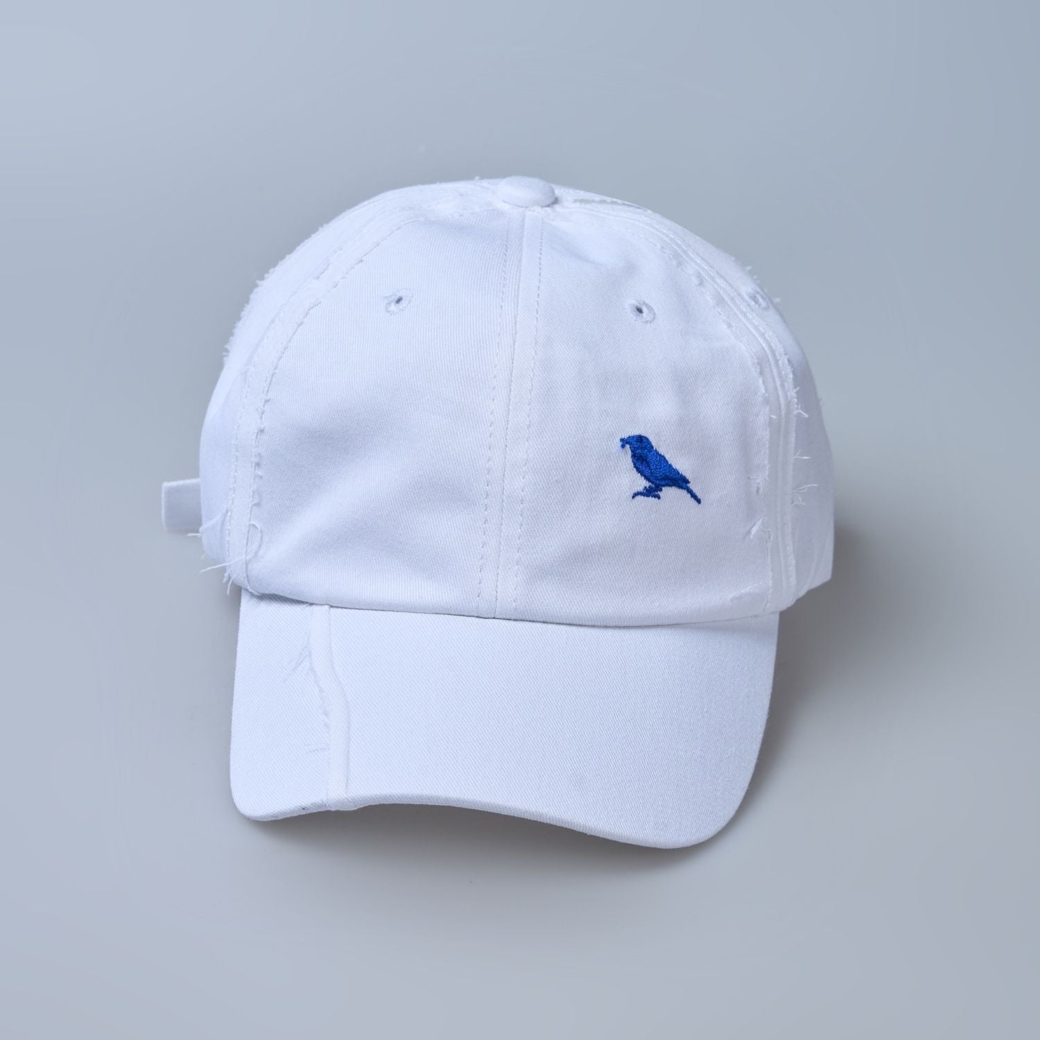 white colored, wide brim polo cap for men with adjustable strap, front view.