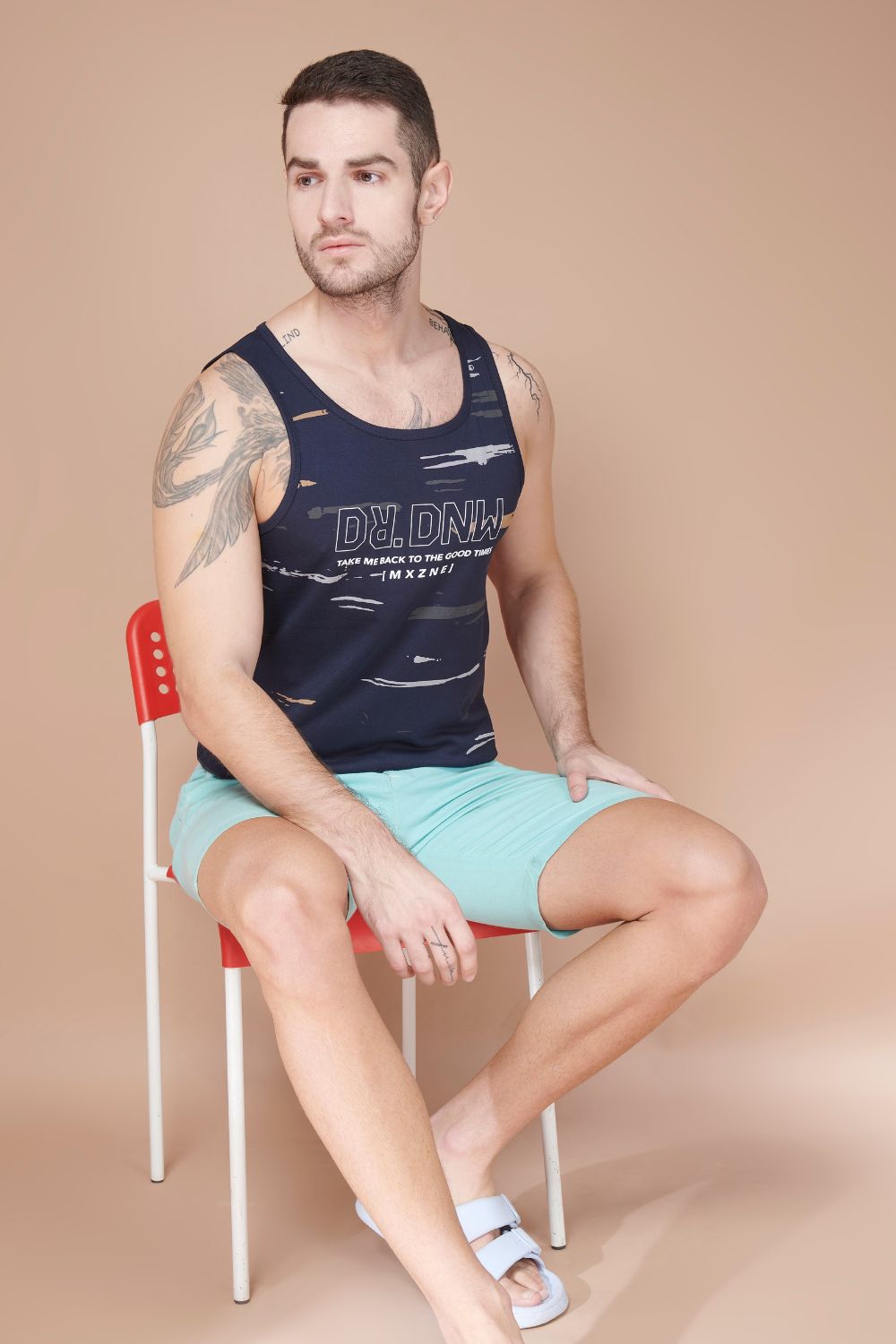 Teal navy colored cotton Sleeveless Printed Tank Tees for men.
