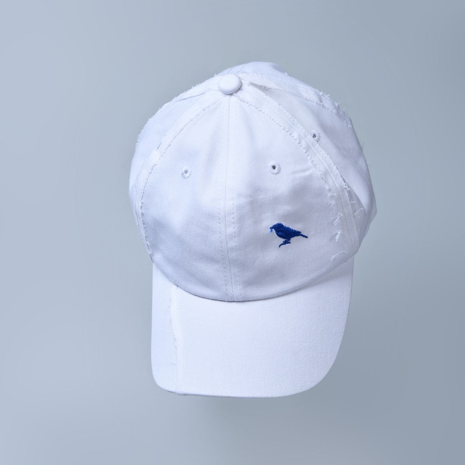 white colored, wide brim polo cap for men with adjustable strap.