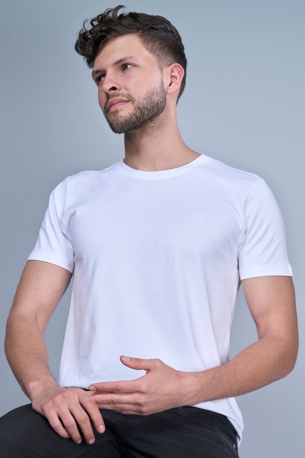 White colored, solid t shirt for men with round neck and half sleeves, front view.