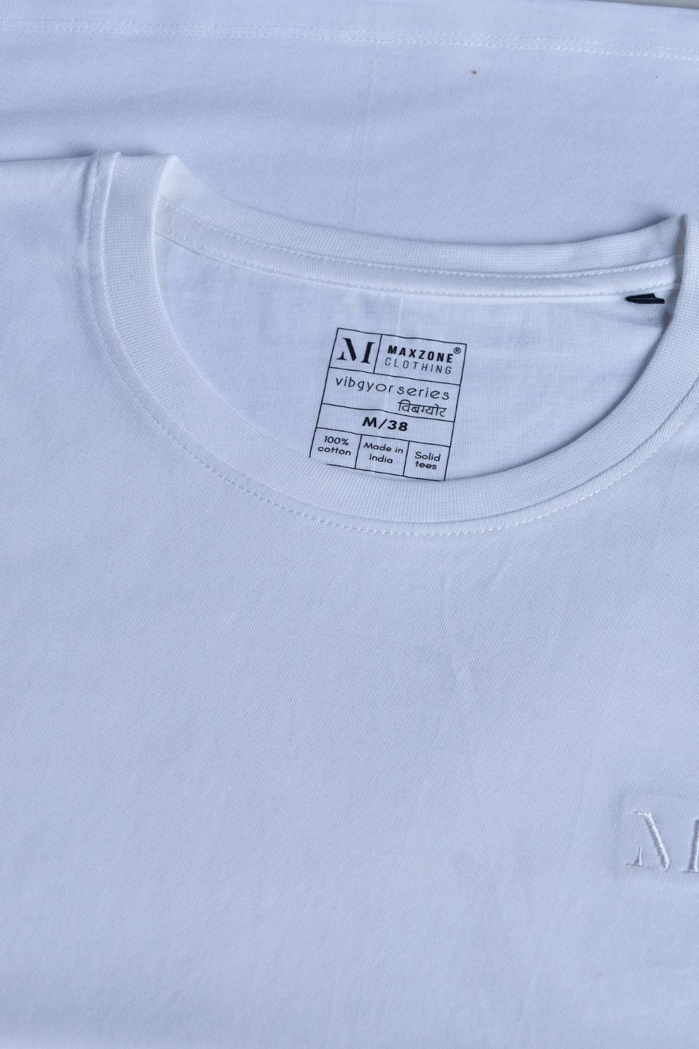 White colored, solid t shirt for men with round neck and half sleeves, product close up.