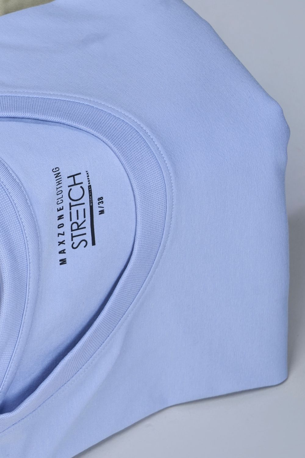 Cotton Stretch T shirt for men in the the solid color Powder Blue with half sleeves and round neck, product close up.