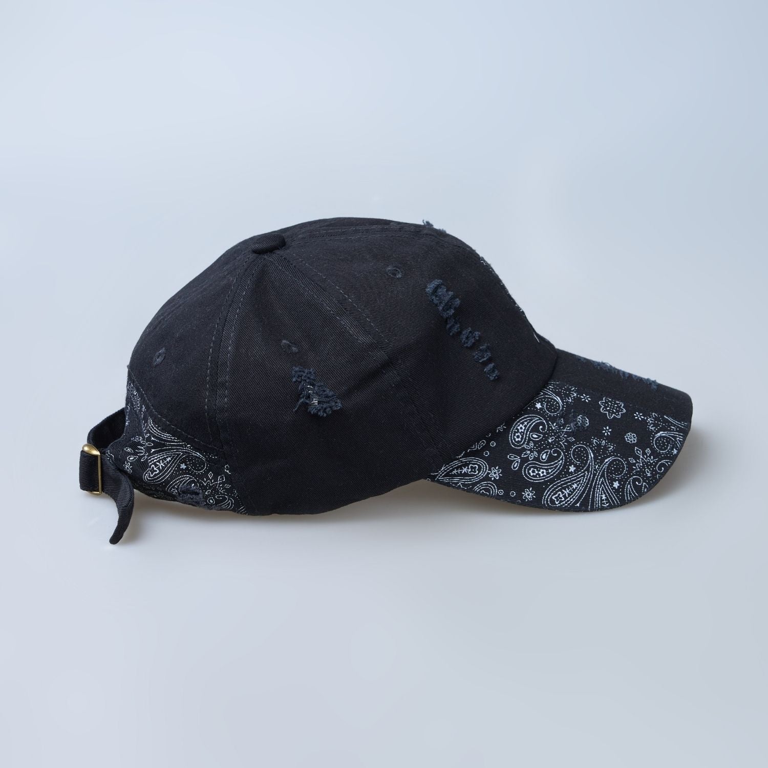 Black colored design patterned cap for men, Side view.