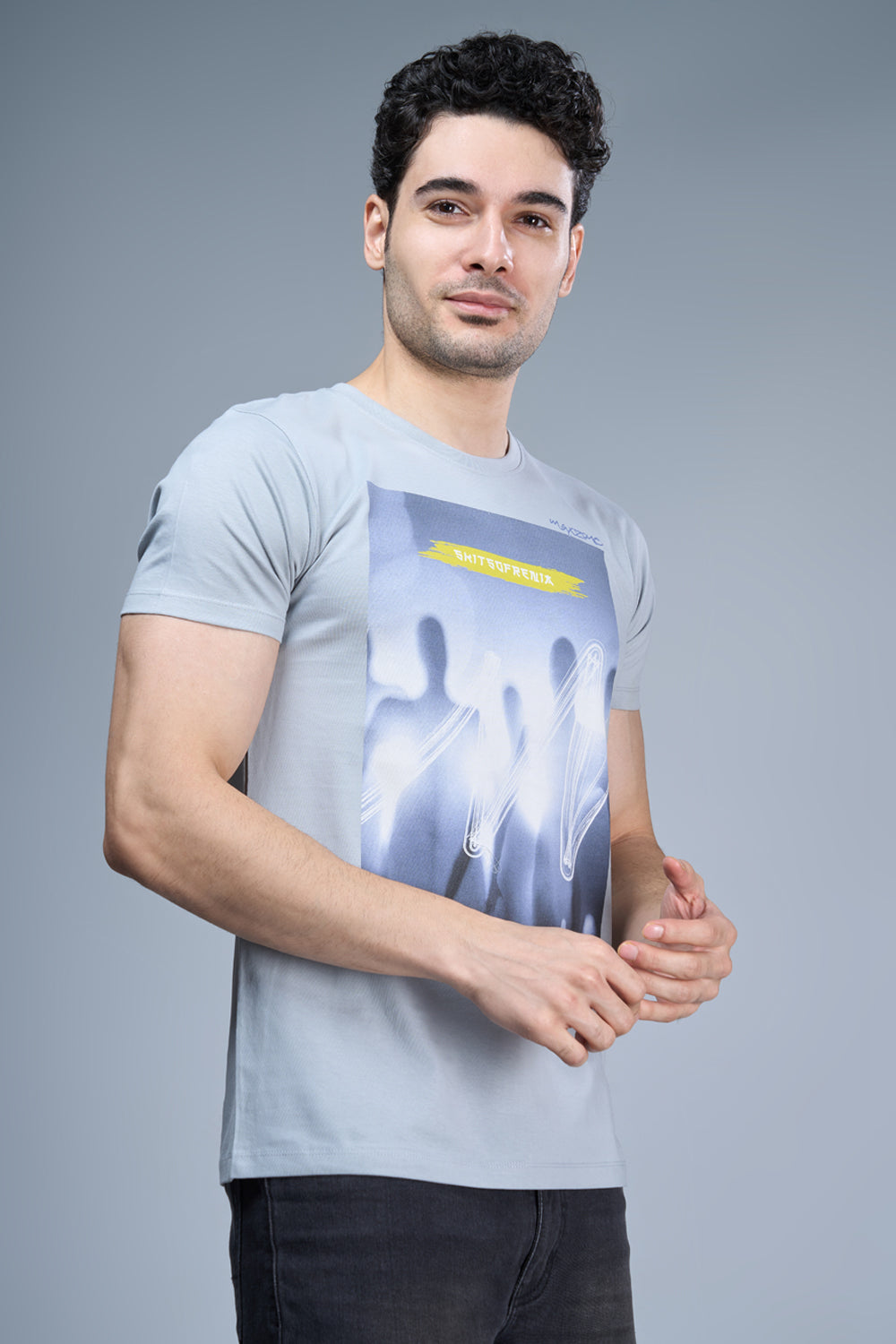 A model wearing Night blue colored, cotton Graphic T shirt for men, half sleeves and round neck.
