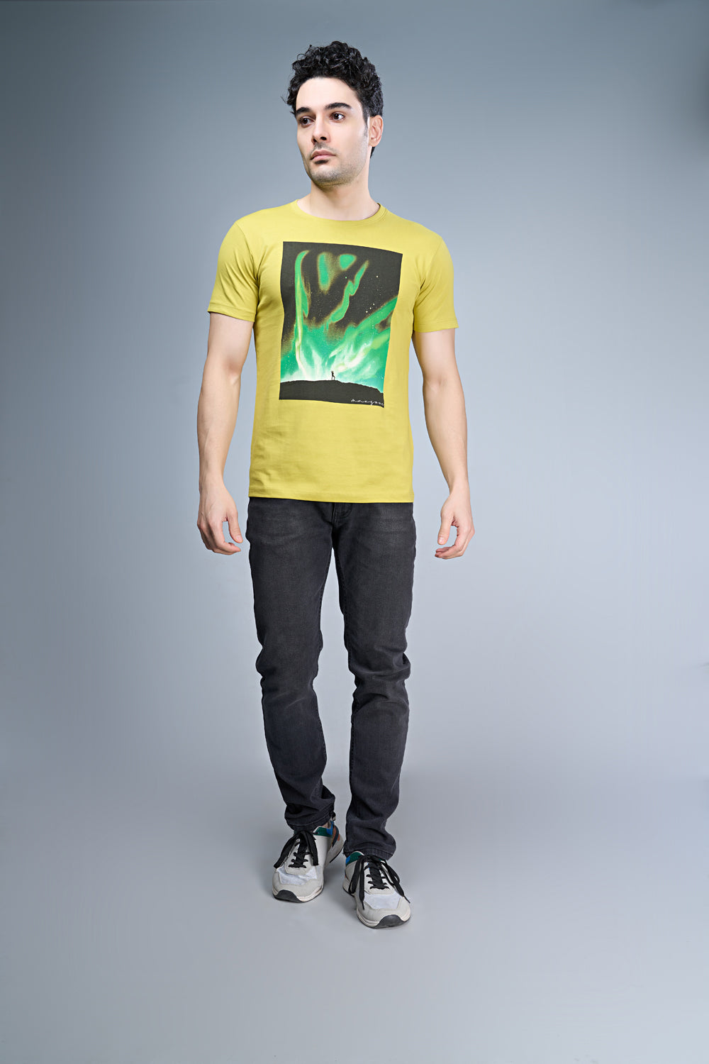 B. Yellow colored, cotton Graphic T shirt for men, half sleeves and round neck.