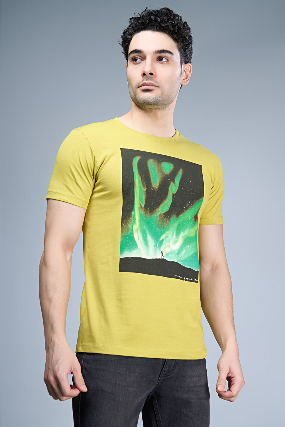 B. Yellow colored, cotton Graphic T shirt for men, half sleeves and round neck, side view.