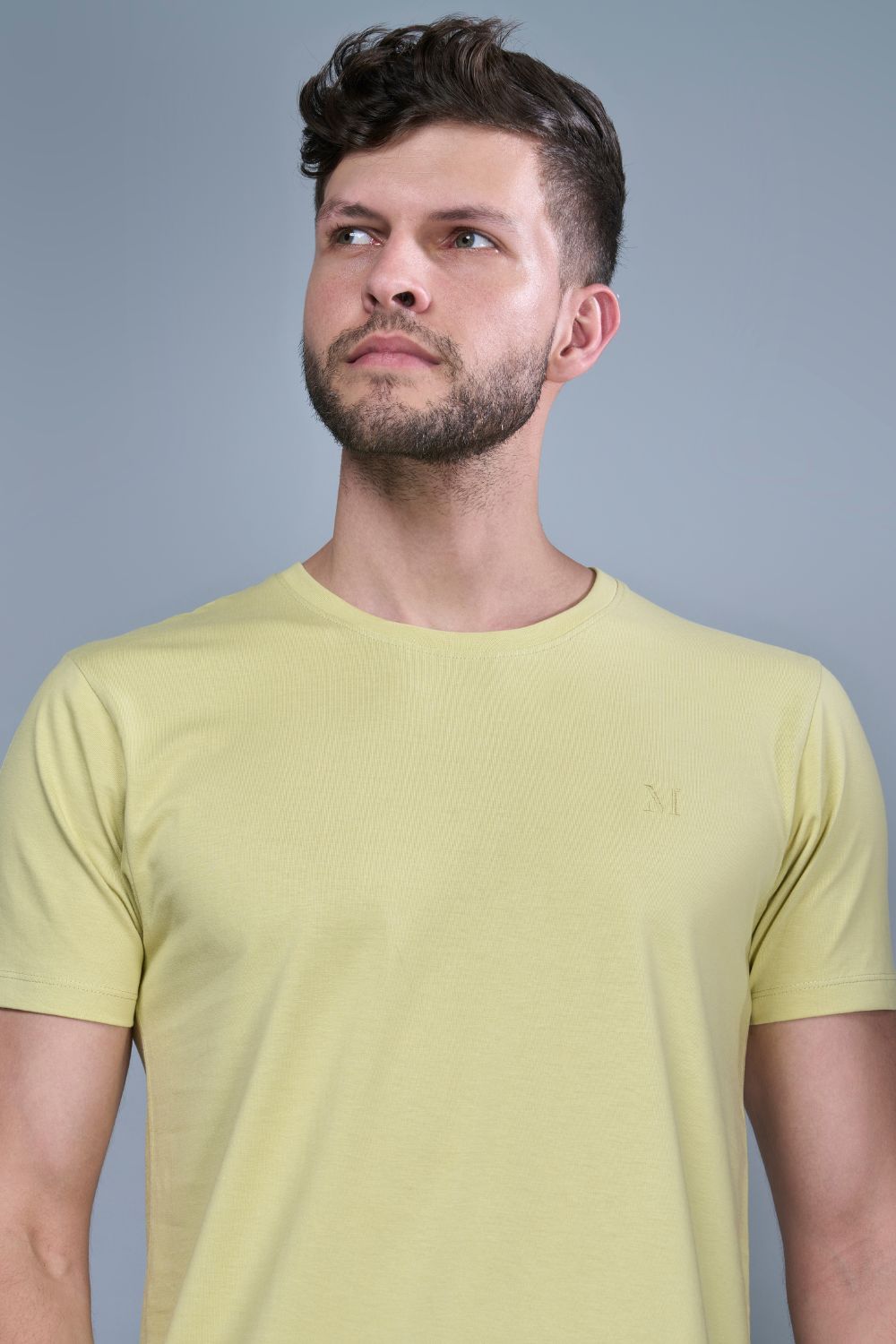 Lemon green colored, Solid T shirt for men, with half sleeves and round neck, front view.