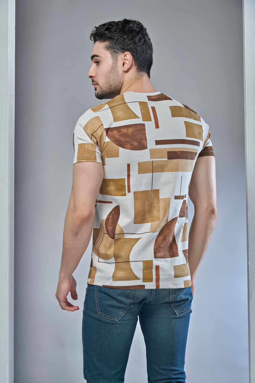 Back view of Golden brown colored, All over print T shirt for men with short sleeves and round neck.